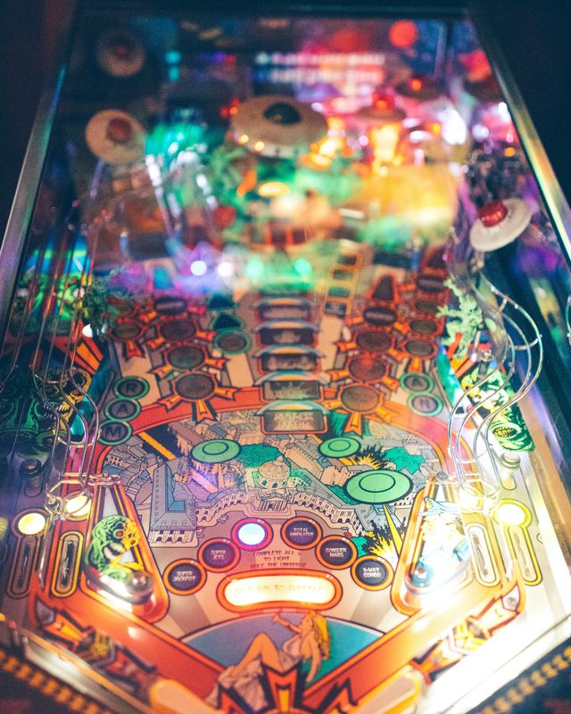 A pinball playfield lit up mid-game